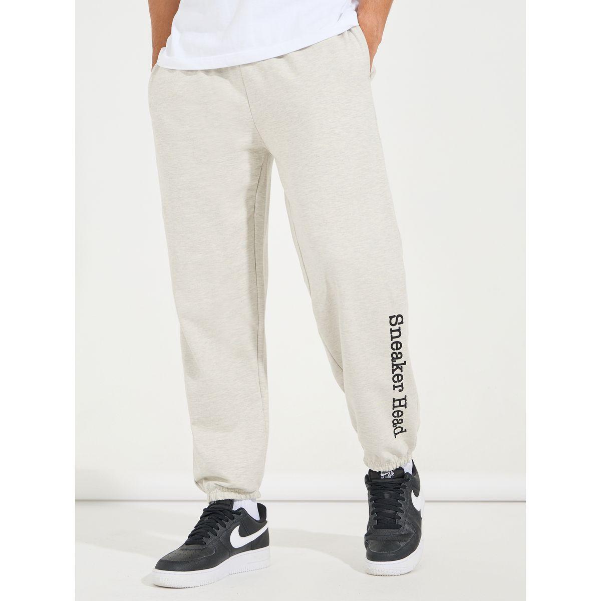 جوغر تيري بقصة مريحة وحافة مطبعة-men-clothing-bottoms-joggers-image-1
