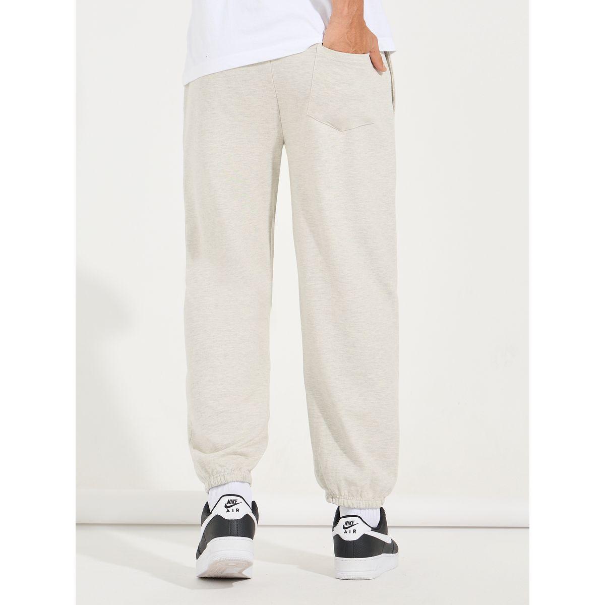 جوغر تيري بقصة مريحة وحافة مطبعة-men-clothing-bottoms-joggers-image-5