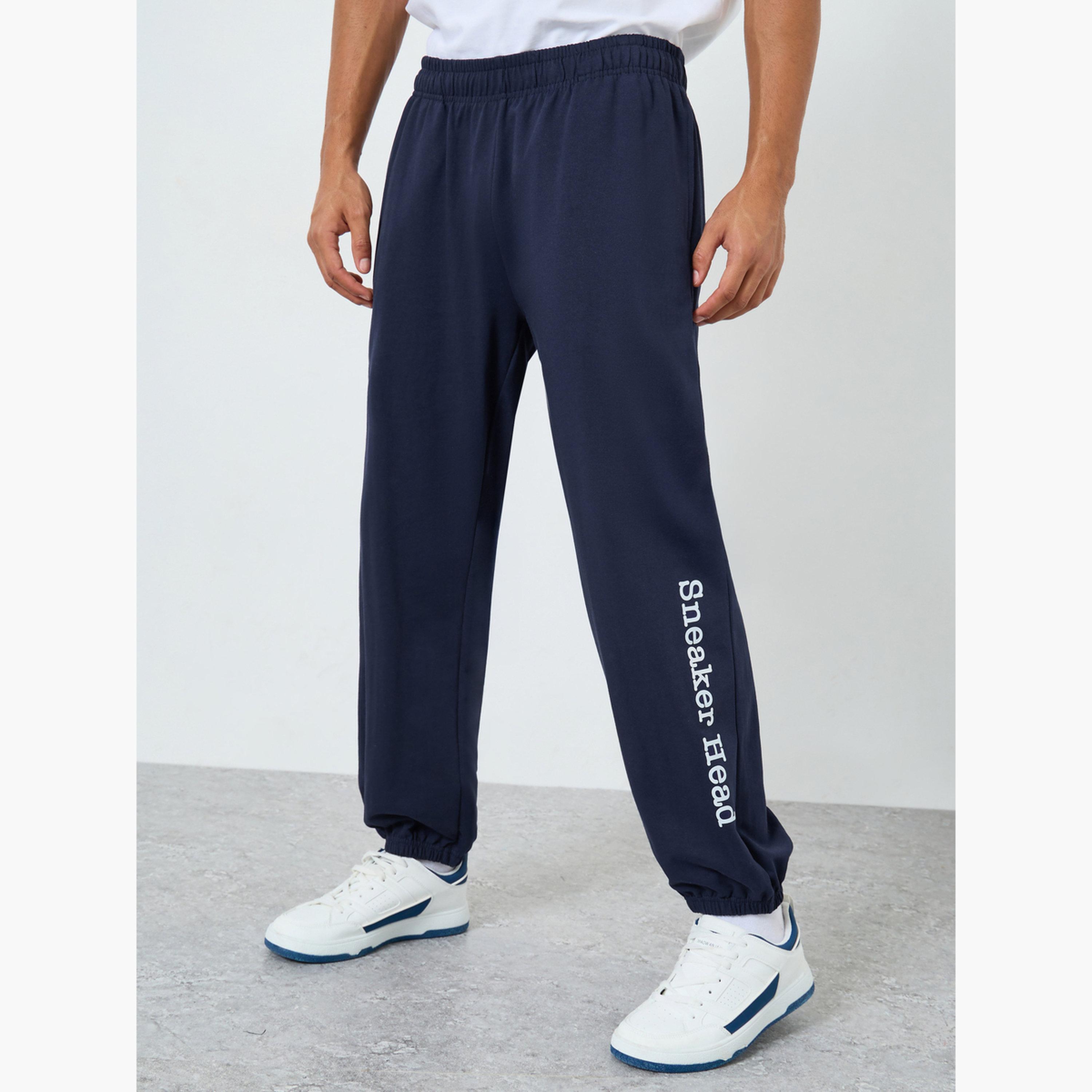 Styli Men Navy Blue Slogan Print Relaxed Joggers-men-clothing-bottoms-joggers-image-1