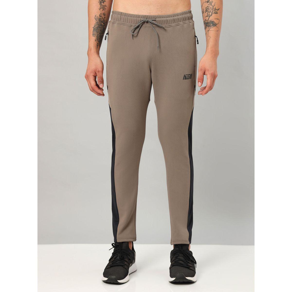 بنطال رياضي برباط خصر وجيوب تكنوسبورت × ستايلي-men-clothing-sportswearandactivewear-bottoms-joggers-image-1
