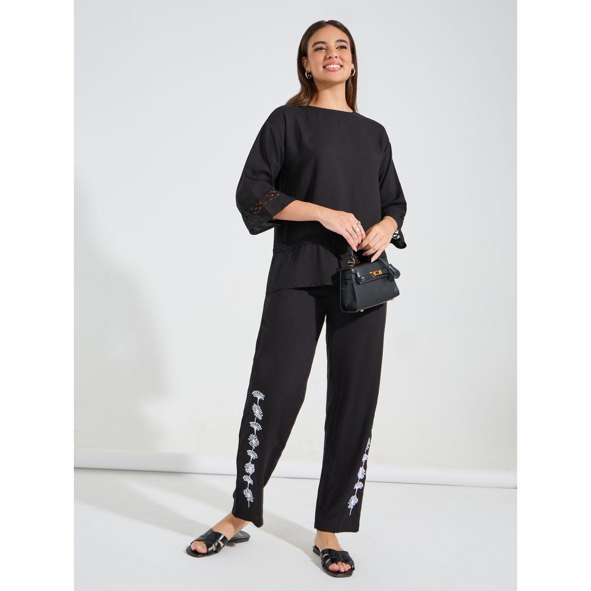 طقم منسق من بنطال بقصة مستدقة مع بلوزة فضفاضة-women-clothing-coordsets-image-1