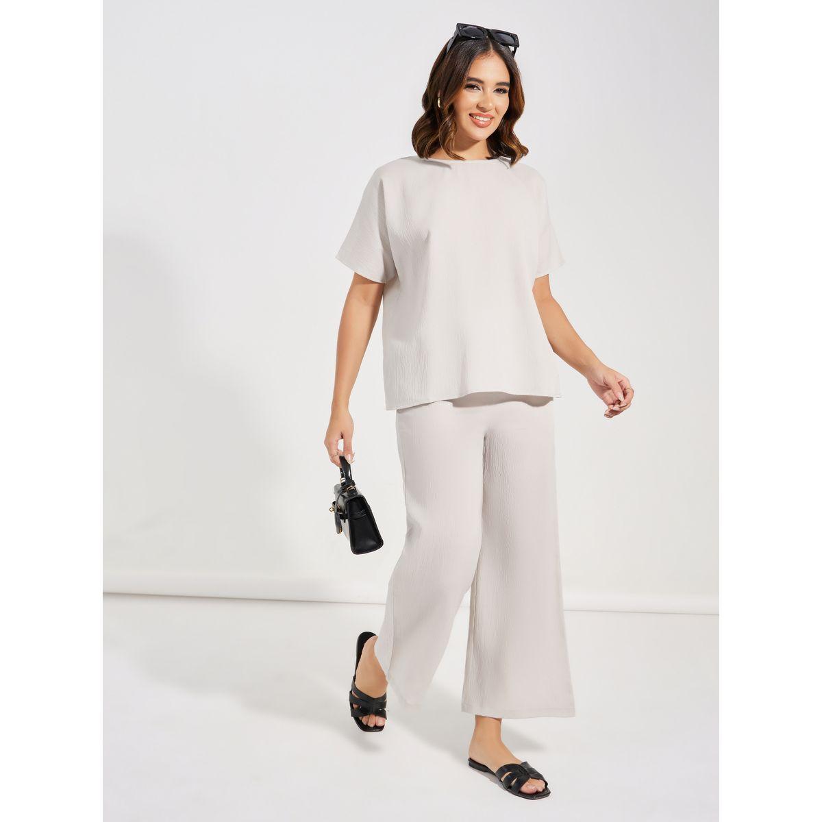 طقم منسق من بنطال واسع مع بلوزة بياقة دائرية-women-clothing-coordsets-image-1