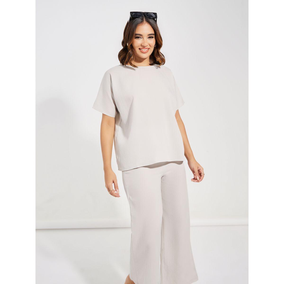 طقم منسق من بنطال واسع مع بلوزة بياقة دائرية-women-clothing-coordsets-image-2