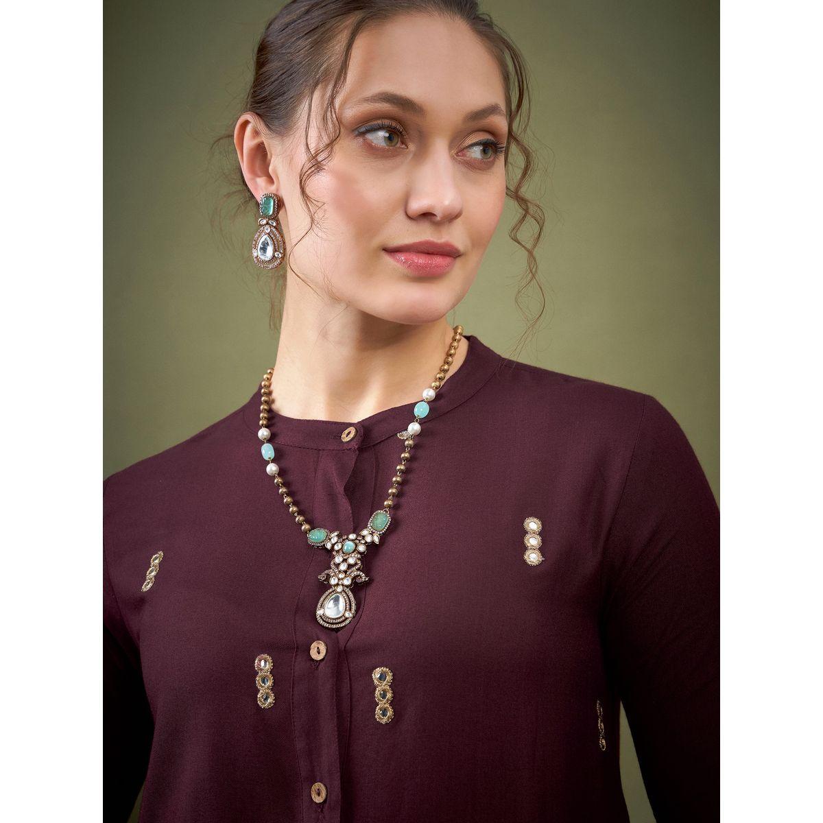 مجموعة من بنطال بالازو مع بلوزة بتفاصيل مُطرّزة ساسافراس × ستايلي-women-clothing-coordsets-image-4