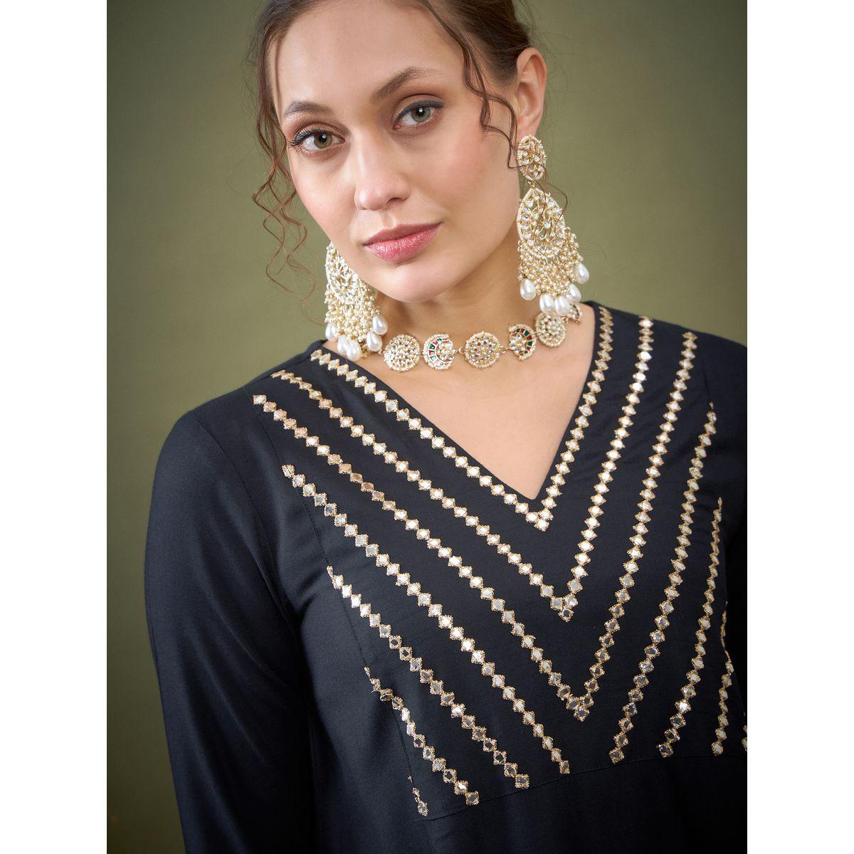 طقم منسق من بنطال بارجل واسعة وبلوزة بتفاصيل مُطرّزة ساسافراس × ستايلي-women-clothing-coordsets-image-4