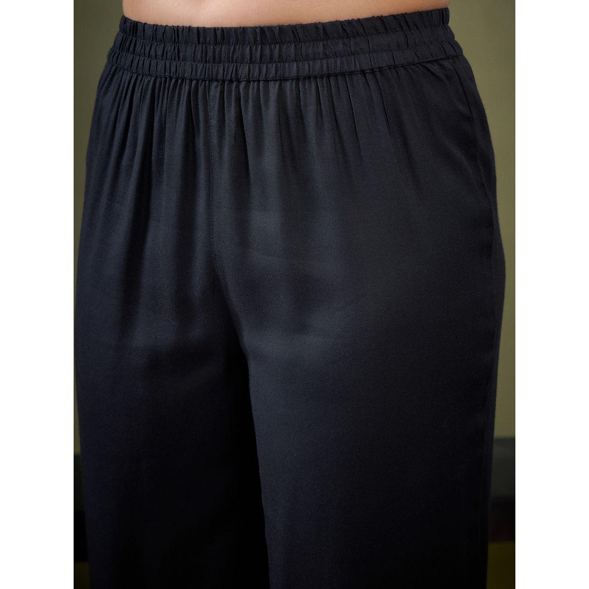 طقم منسق من بنطال بارجل واسعة وبلوزة بتفاصيل مُطرّزة ساسافراس × ستايلي-women-clothing-coordsets-image-5
