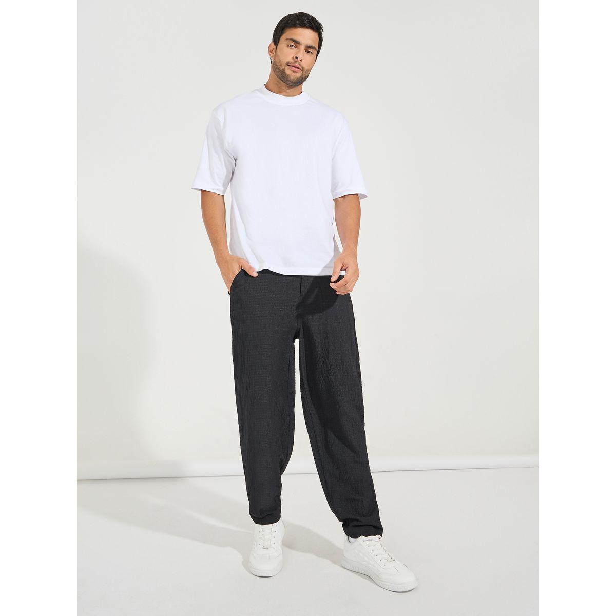 بنطال بقصة مستدقة وتفاصيل بارزة الملمس-men-clothing-bottoms-trousersandchinos-trousers-image-2