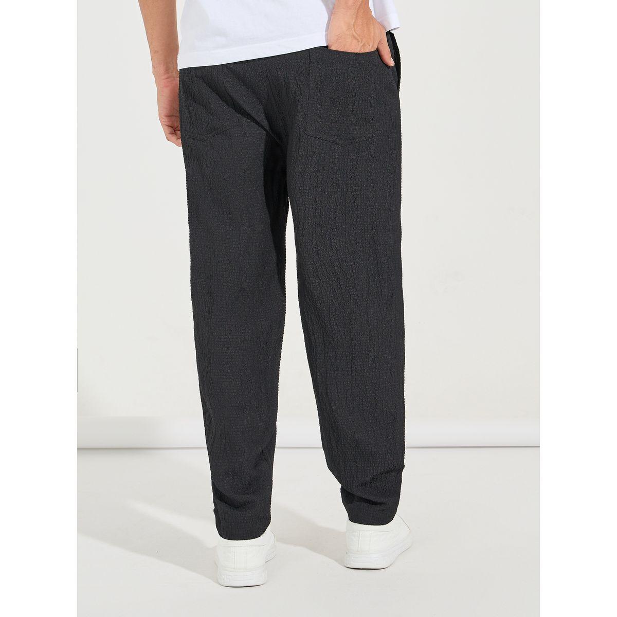 بنطال بقصة مستدقة وتفاصيل بارزة الملمس-men-clothing-bottoms-trousersandchinos-trousers-image-4