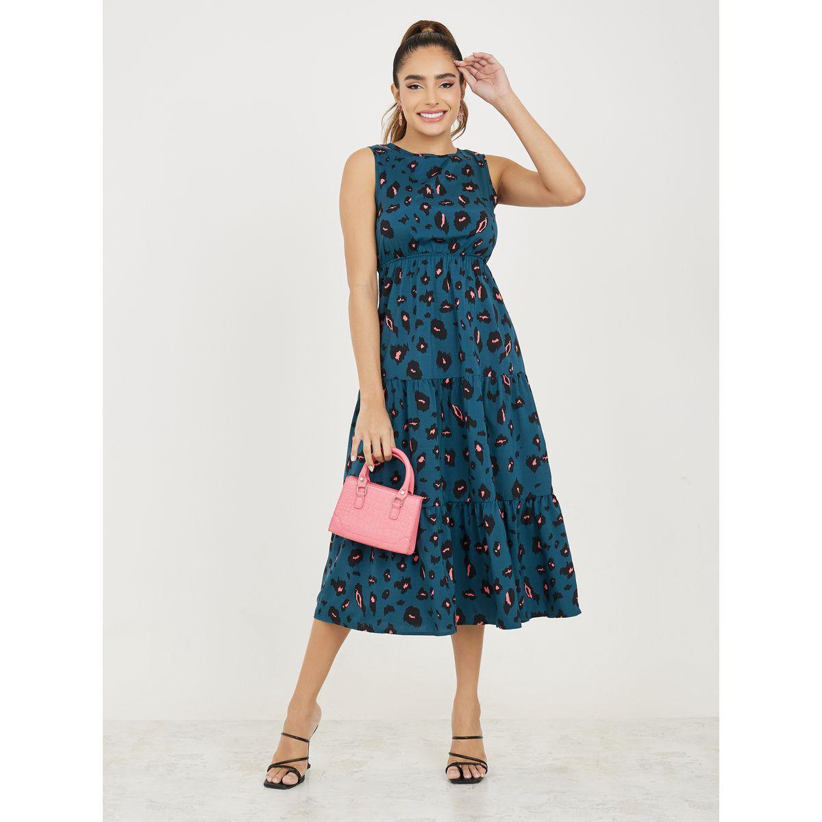 فستان ميدي بلا اكمام ومطبع بطبعة فهد-women-clothing-dresses-image-1