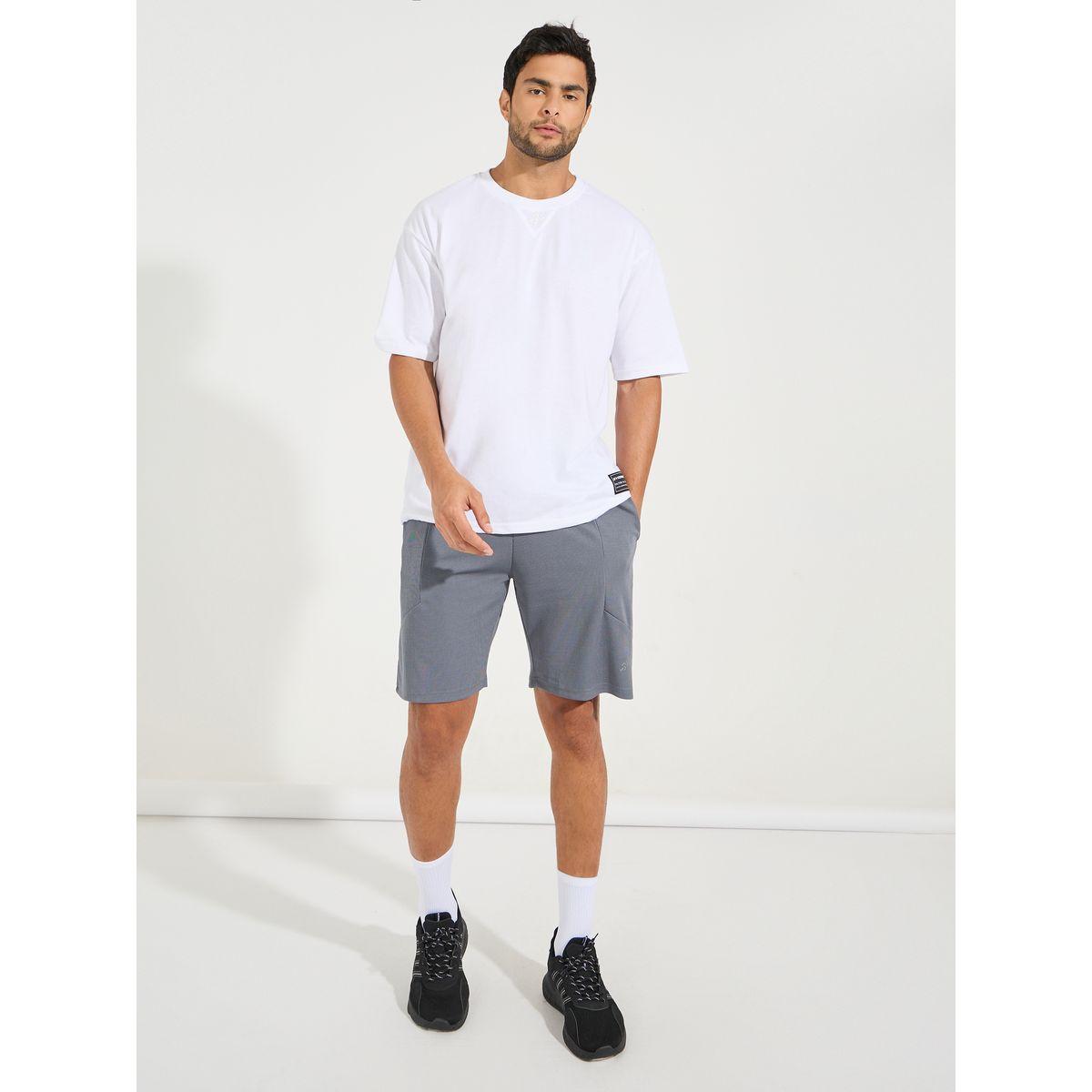 تيشيرت قطن بقصة فضفاضة واكمام قصيرة-men-clothing-sportswearandactivewear-tshirtsandpolos-image-2