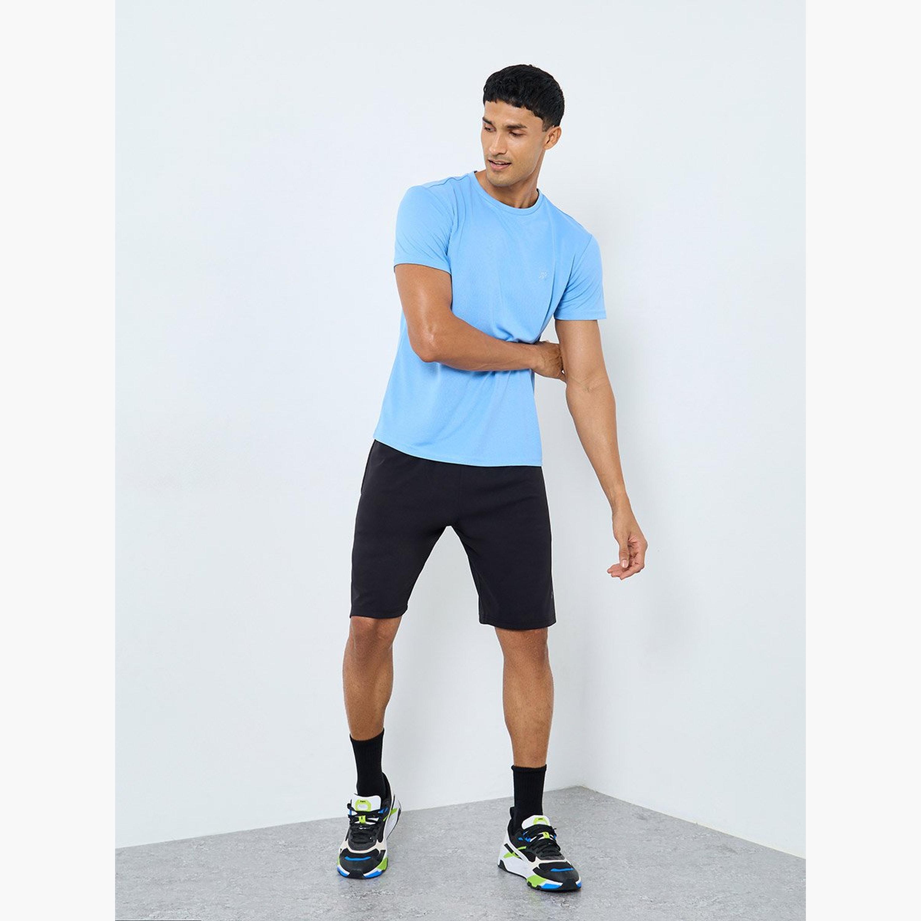 طقم من شورت وتيشيرت تمرين-men-clothing-sportswearandactivewear-tracksuits-image-1