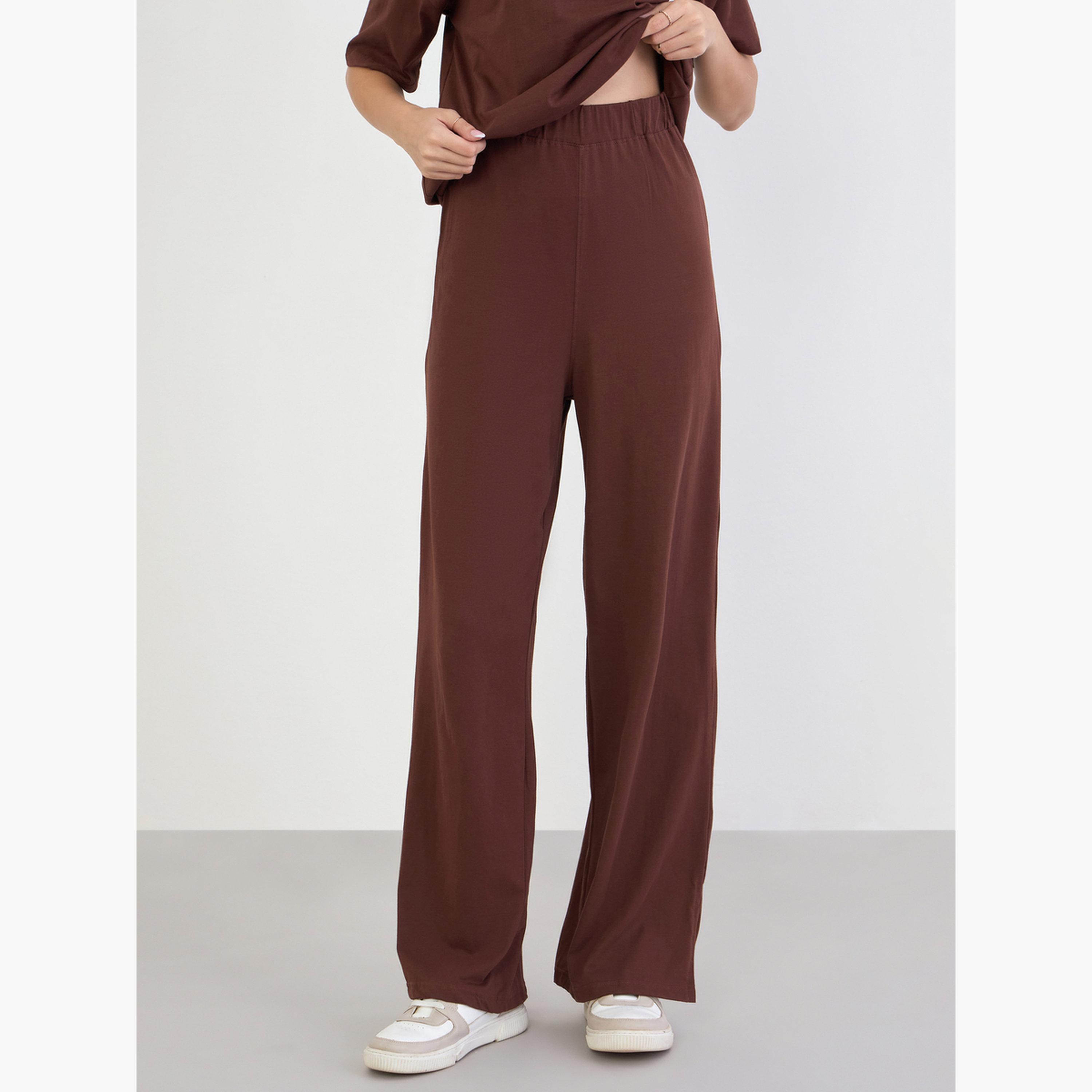 ستايلي - تي شيرت حجم كبير مع بنطال رياضي واسع الساق-women-clothing-coordsets-image-5