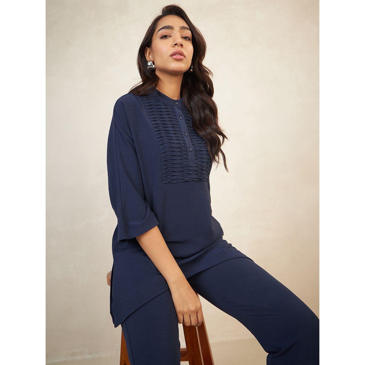 طقم منسق من بنطال مع بلوزة بتفاصيل محزوزة فِميلا × ستايلي-women-clothing-coordsets-image-6