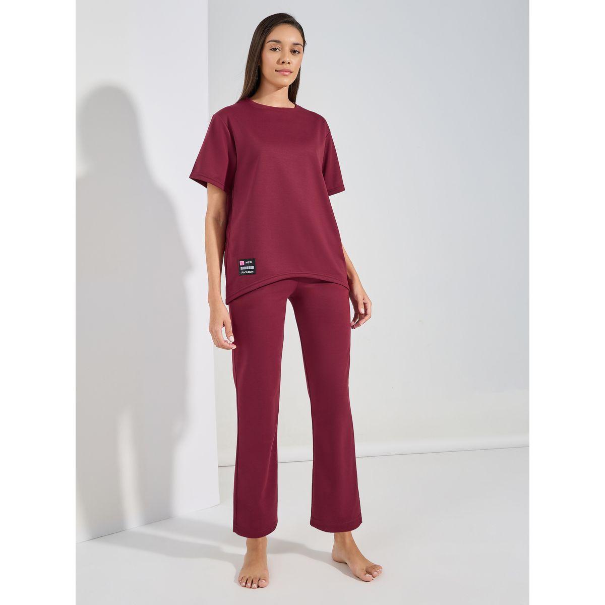 مجموعة من بنطال مع تيشيرت مزين بشارة-women-clothing-coordsets-image-1