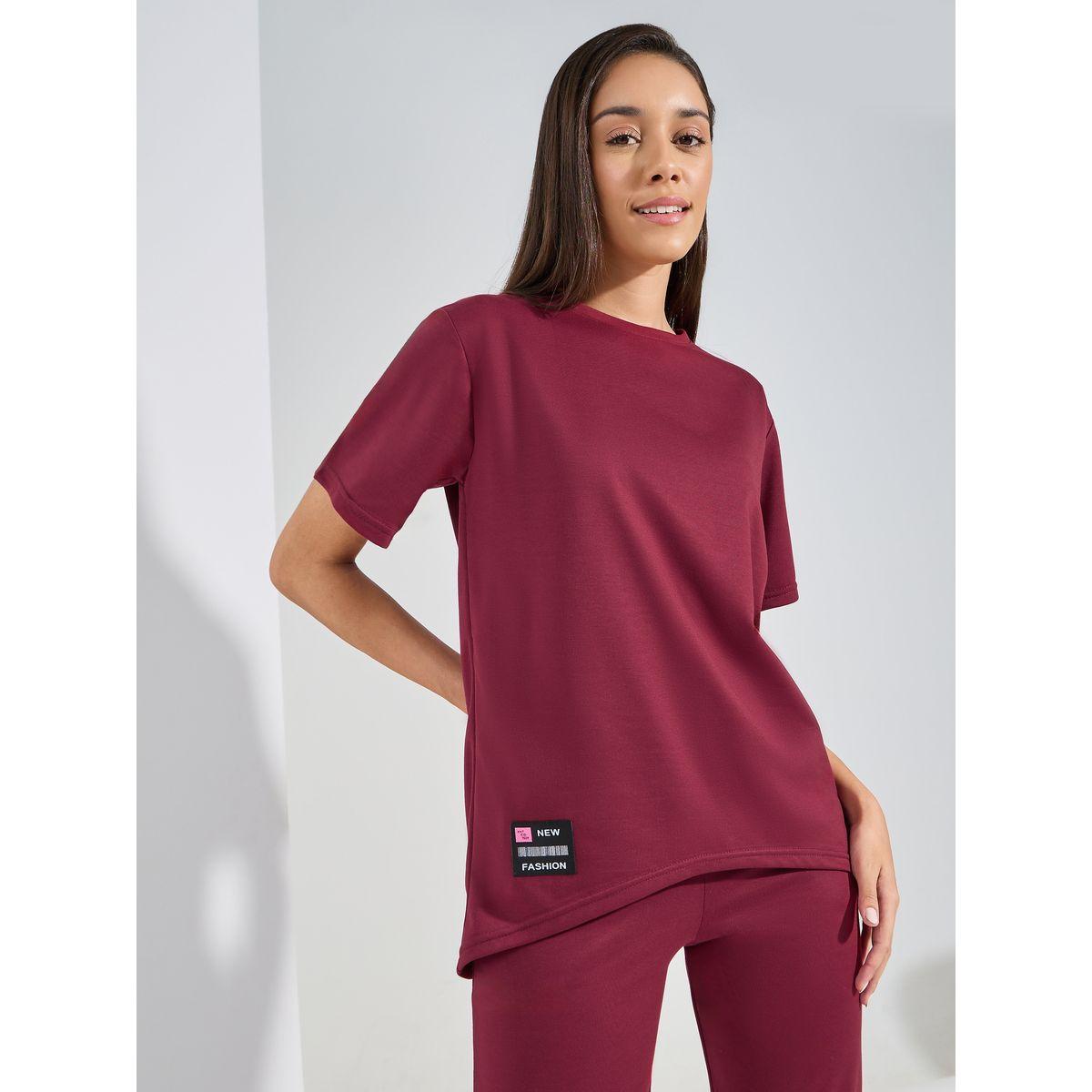 مجموعة من بنطال مع تيشيرت مزين بشارة-women-clothing-coordsets-image-2