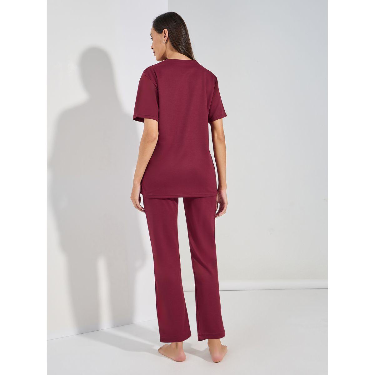 مجموعة من بنطال مع تيشيرت مزين بشارة-women-clothing-coordsets-image-5