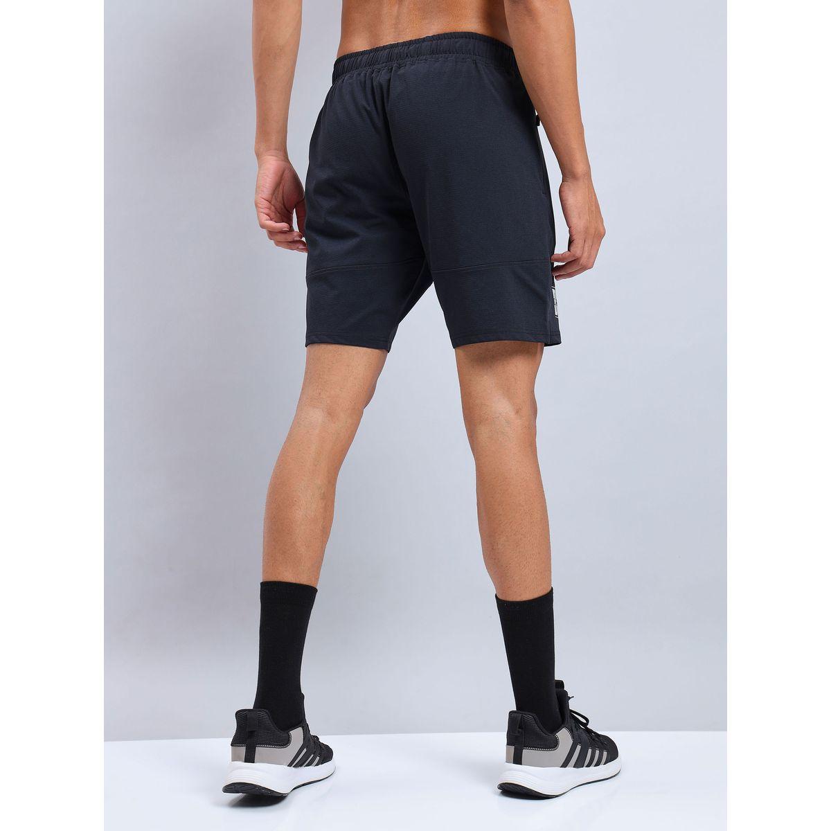 شورت سادة بقصة مريحة وقابل للتمدد تكنوسبورت × ستايلي-men-clothing-sportswearandactivewear-bottoms-image-2