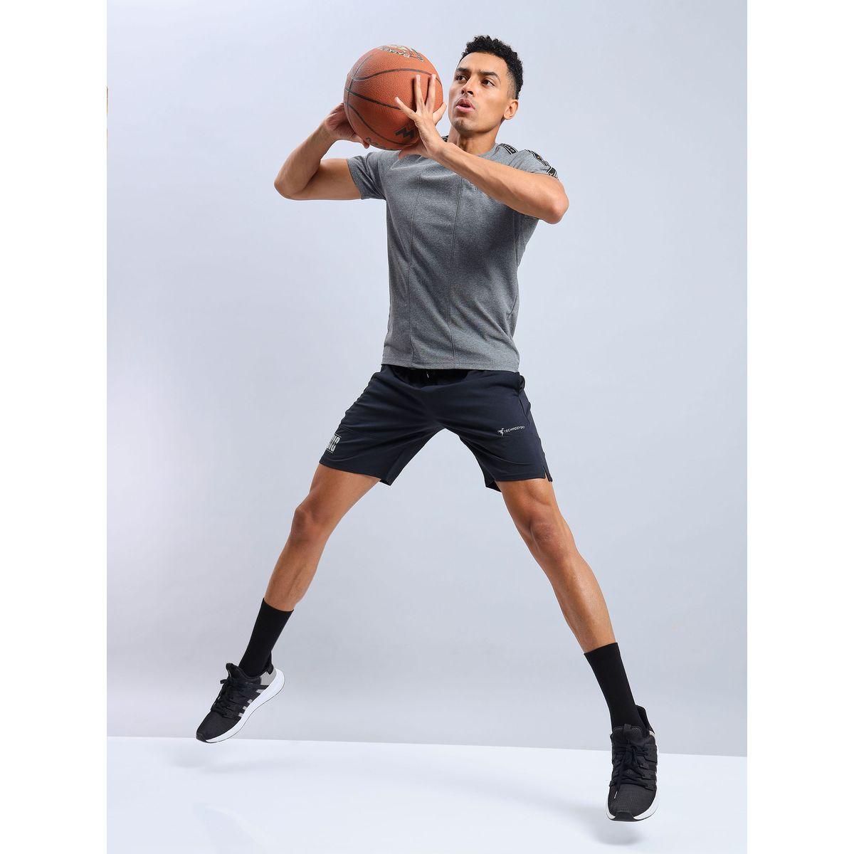 شورت سادة بقصة مريحة وقابل للتمدد تكنوسبورت × ستايلي-men-clothing-sportswearandactivewear-bottoms-image-5