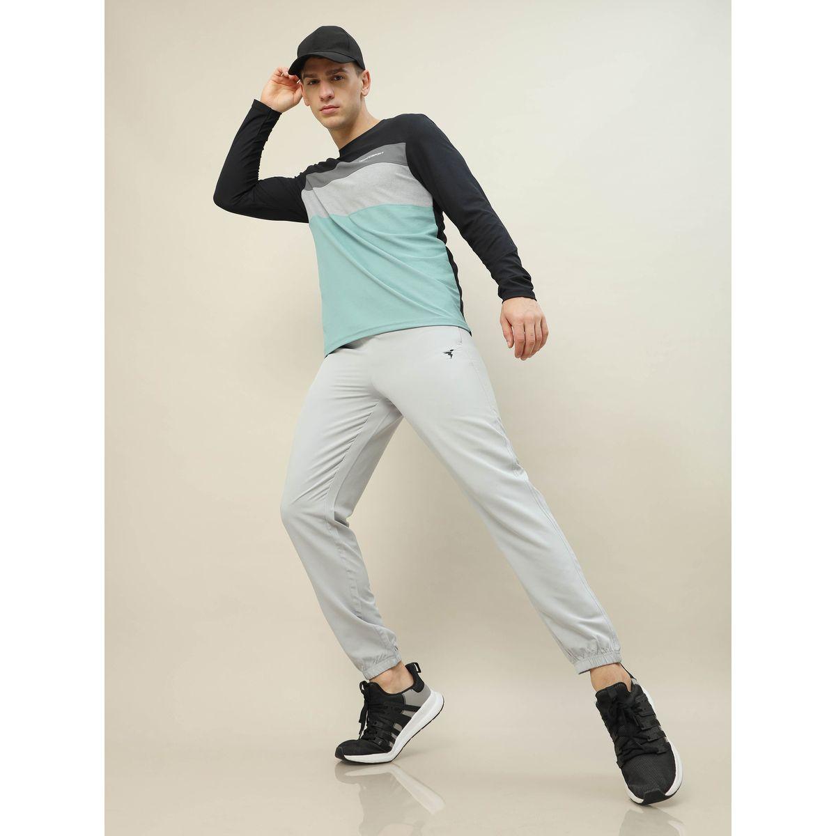 جوغر منسوج سادة مع اساور مطاطية تكنوسبورت × ستايلي-men-clothing-sportswearandactivewear-bottoms-image-1