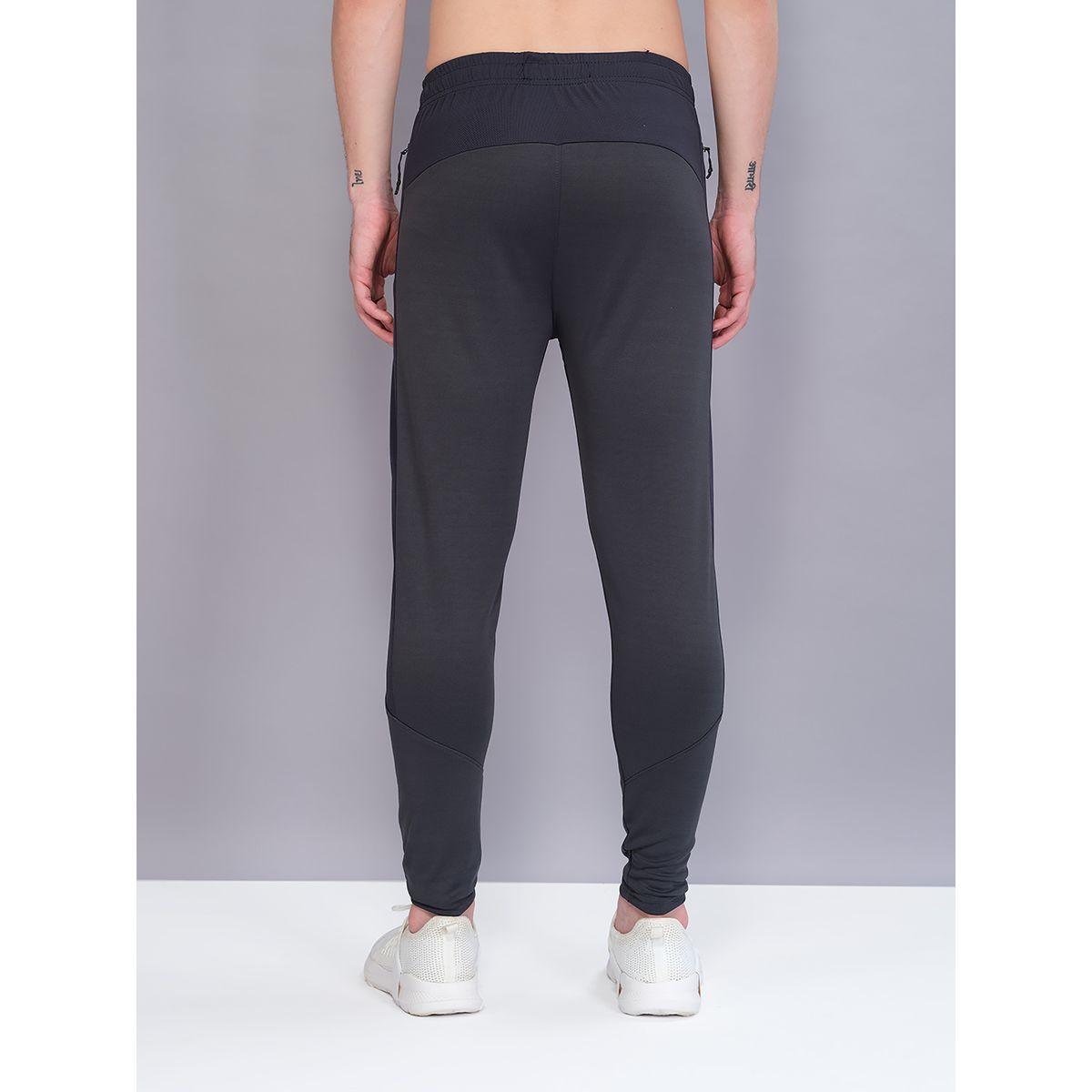 بنطال رياضي سادة بقصة سليم فت مع شعار تكنوسبورت × ستايلي-men-clothing-sportswearandactivewear-bottoms-image-2