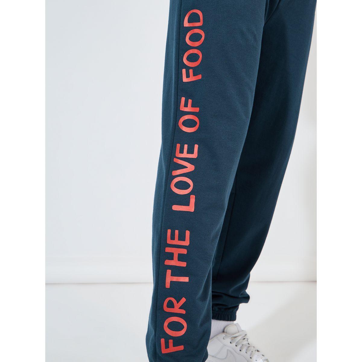 جوغر تيري بقصة فضفاضة وطبعة جرافيك-men-clothing-bottoms-joggers-image-4