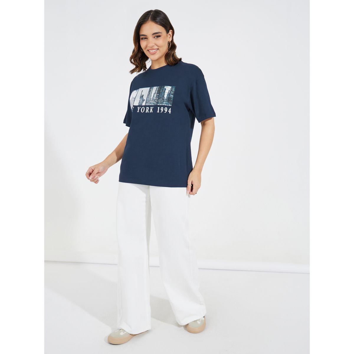 تيشيرت فضفاض بطبعة جرافيك مع أكتاف منخفضة-women-clothing-tshirts-image-2