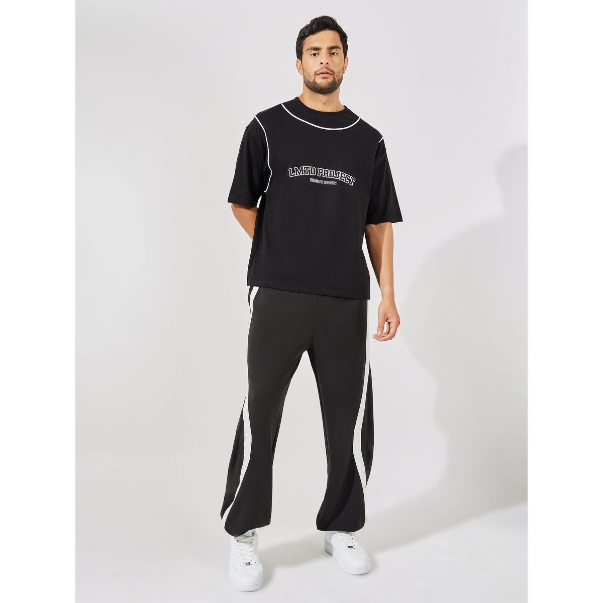 جوغر فضفاض بتفاصيل محبوكة وتداخلات مُتباينة-men-clothing-bottoms-joggers-image-2