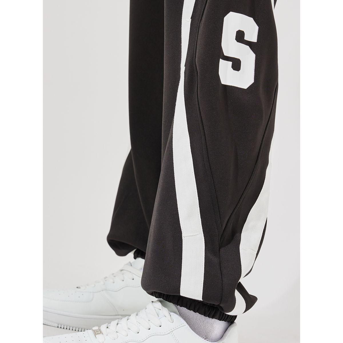 جوغر فضفاض بتفاصيل محبوكة وتداخلات مُتباينة-men-clothing-bottoms-joggers-image-4
