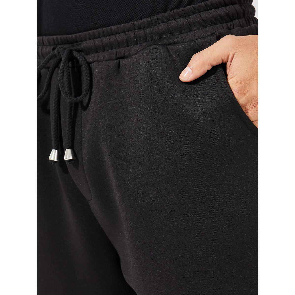 جوغر بقصة بوت كات ومزين بشارة-men-clothing-bottoms-joggers-image-4