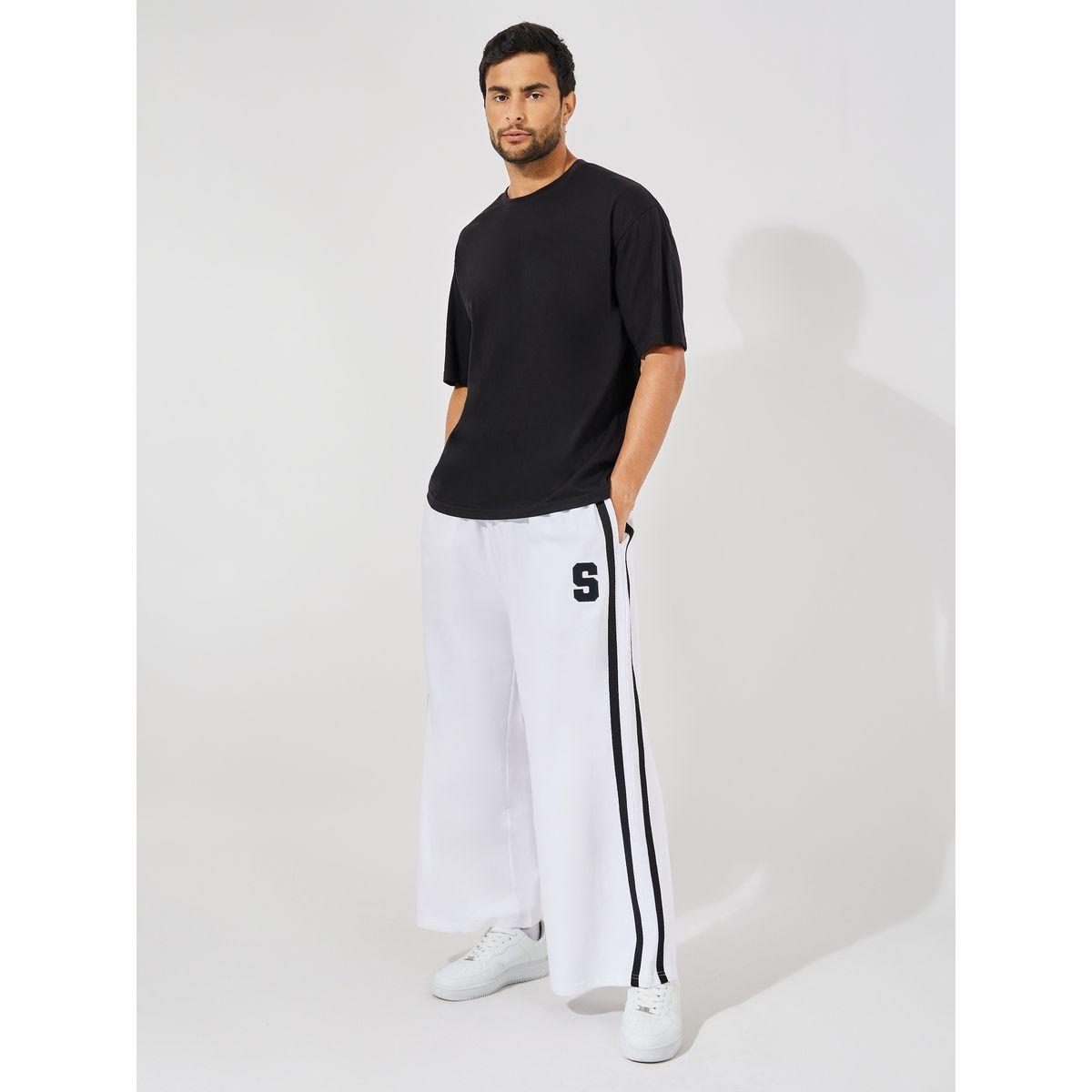 جوغر بارجل واسعة واشرطة جانبية وحرف مُطرّز-men-clothing-bottoms-joggers-image-2