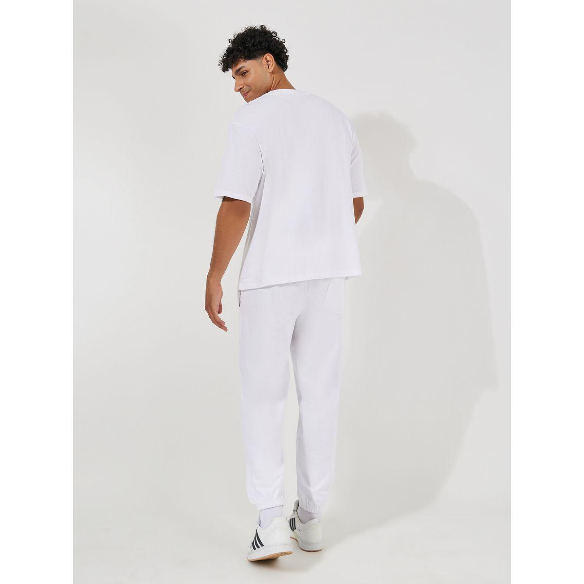 طقم منسق من جوغر مع تيشيرت فضفاض بطبعة فارسيتي-men-clothing-coordsets-image-4