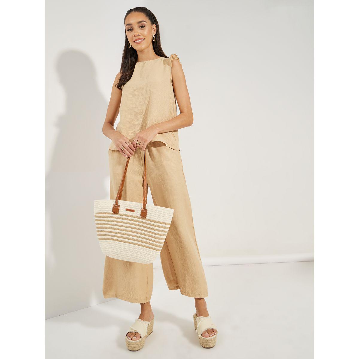 طقم منسق من بنطال بارجل واسعة وبلوزة باكمام كشكش-women-clothing-coordsets-image-1