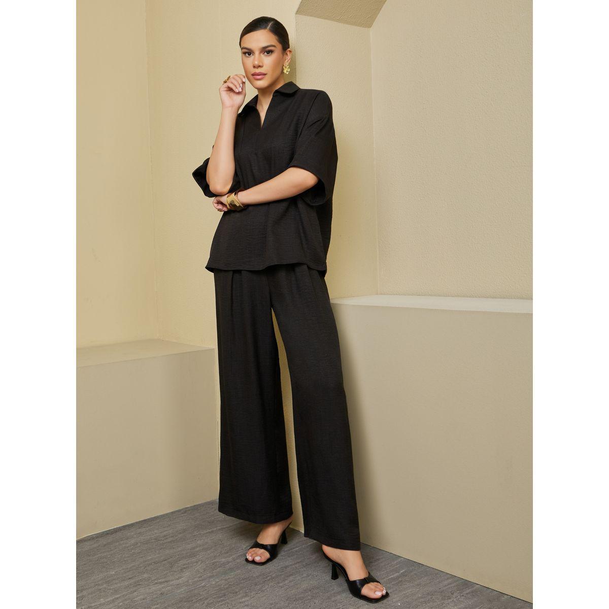 طقم منسق من بلوزة فضفاضة بأكمام قصيرة مع بنطال بأرجل واسعة-women-arabicclothing-sets-image-2