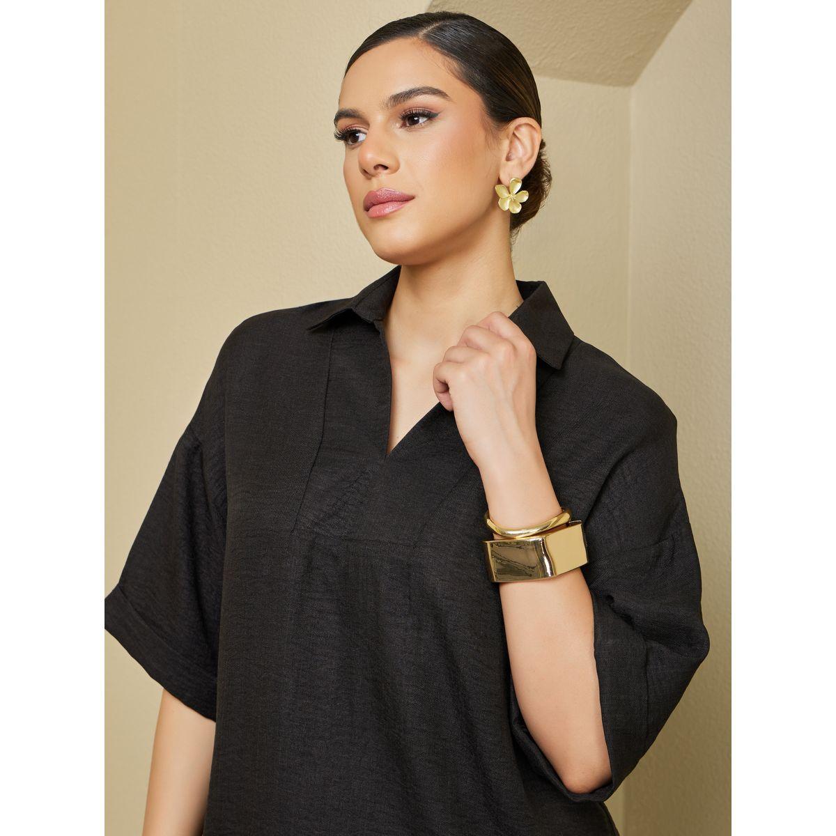 طقم منسق من بلوزة فضفاضة بأكمام قصيرة مع بنطال بأرجل واسعة-women-arabicclothing-sets-image-5