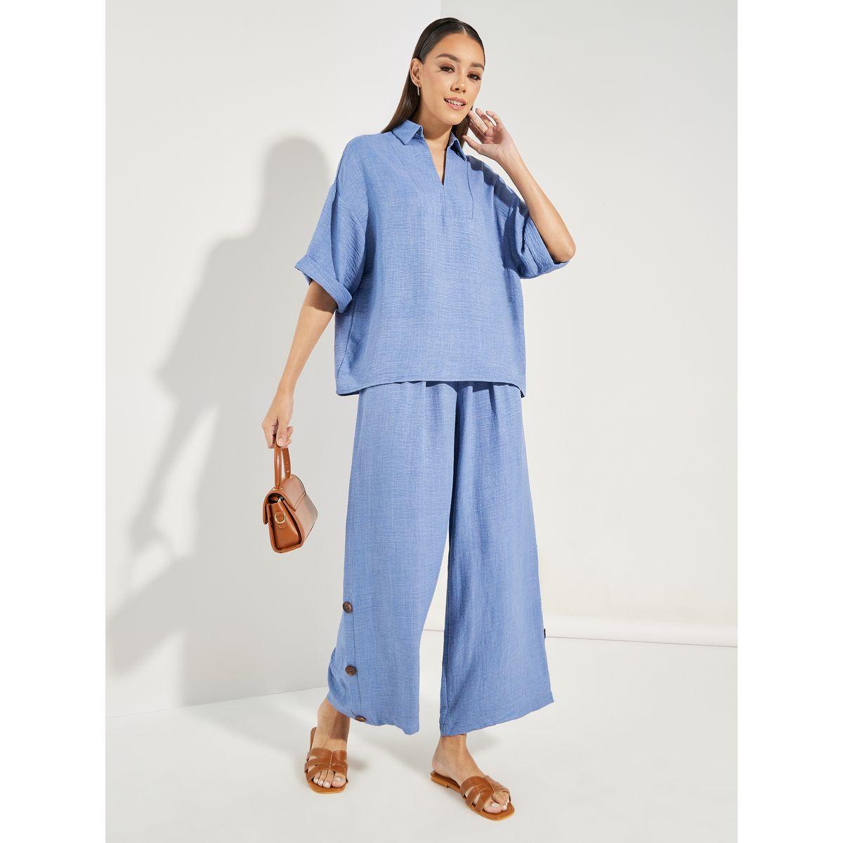 مجموعة من بنطال مزين بازرار مع بلوزة بمظهر دنيم-women-clothing-coordsets-image-1
