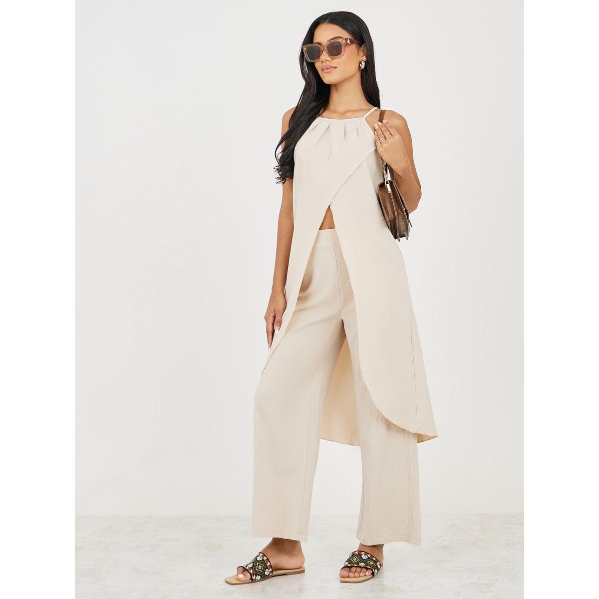 طقم منسق من بنطال بارجل واسعة وبلوزة بياقة هولتر-women-clothing-coordsets-image-1