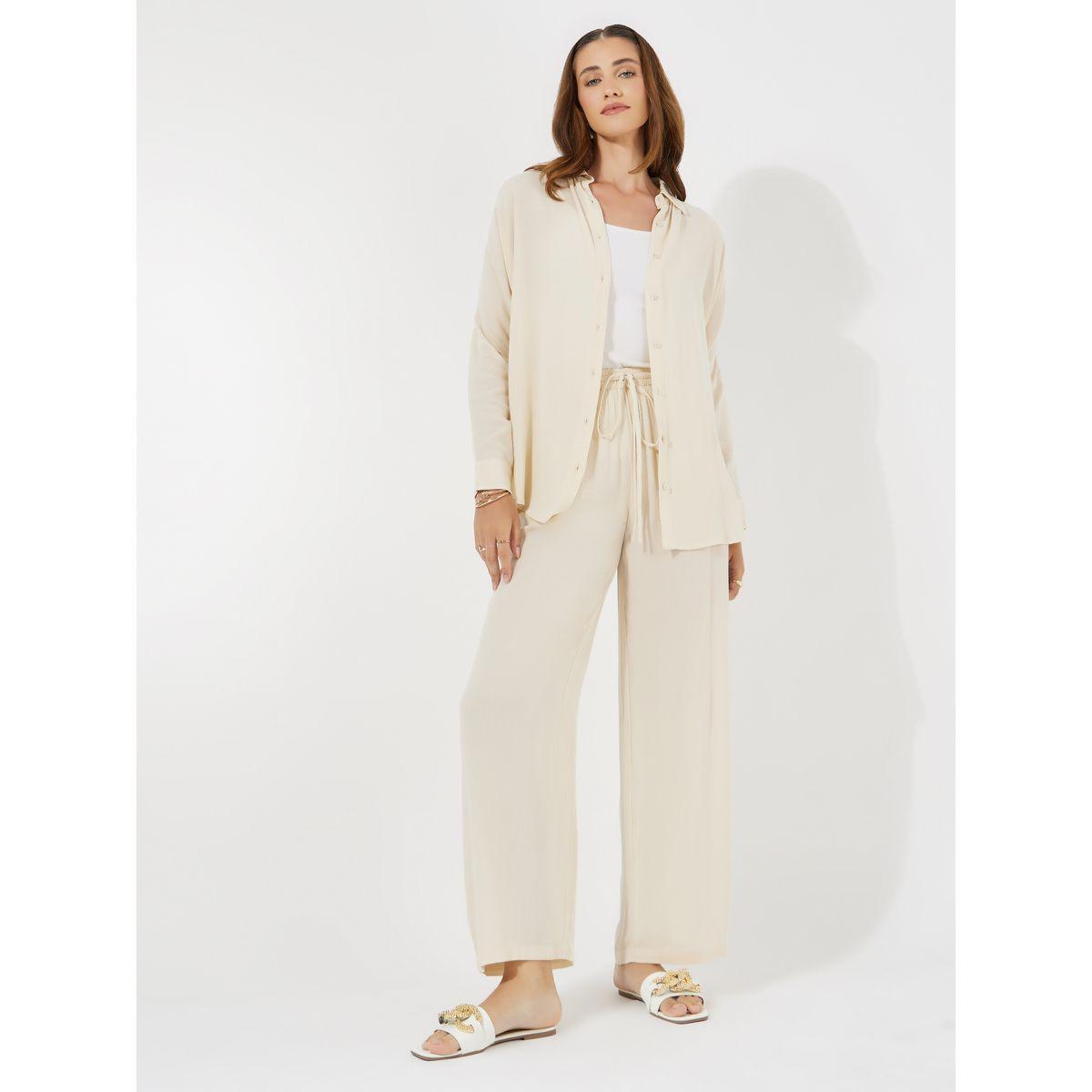طقم منسق من بنطال بارجل واسعة مع بلوزة فضفاضة-women-clothing-coordsets-image-1