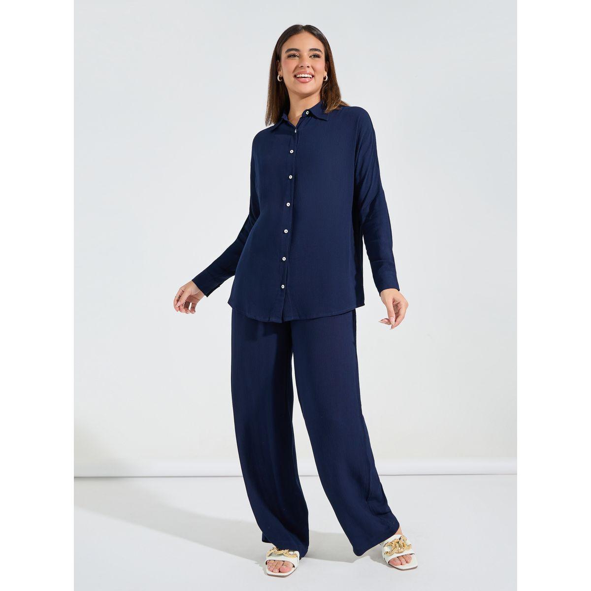 طقم منسق من بنطال بارجل واسعة وبلوزة فضفاضة-women-clothing-coordsets-image-2