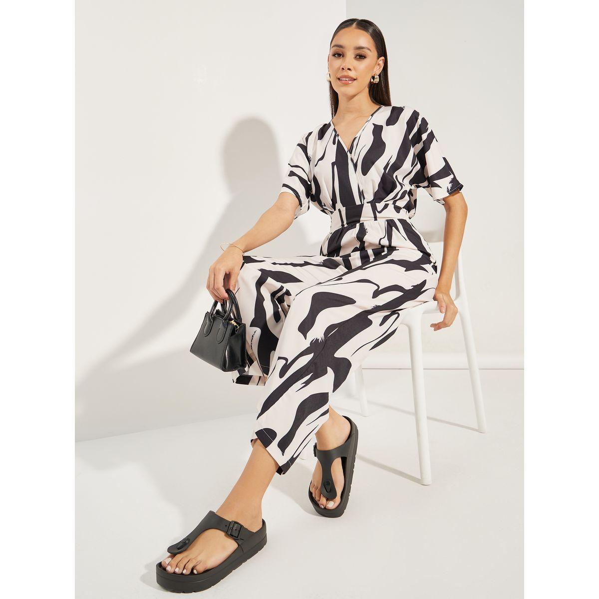 جمبسوت مطبع بالكامل مع اكمام وطواطية كولورفول × ستايلي-women-clothing-jumpsuits-image-1