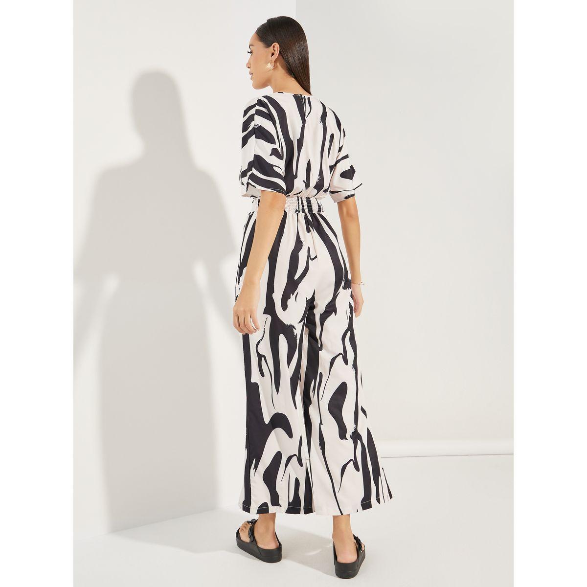 جمبسوت مطبع بالكامل مع اكمام وطواطية كولورفول × ستايلي-women-clothing-jumpsuits-image-5