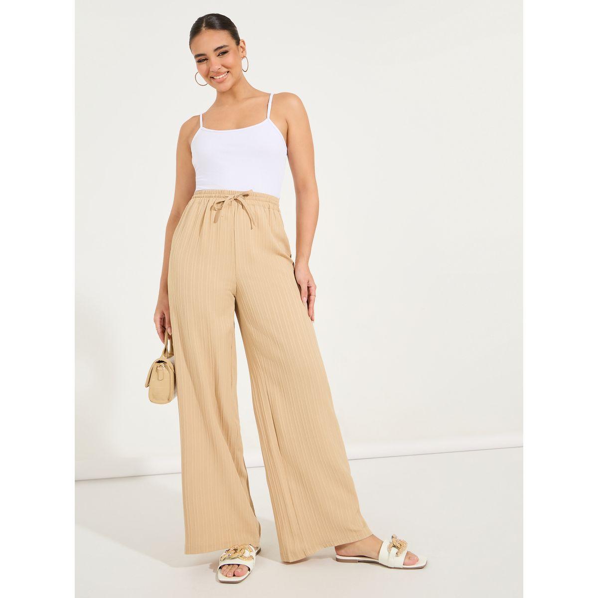 Styli Textured Wide Leg Pants with Drawstrings-women-clothing-bottoms-trousers-image-1