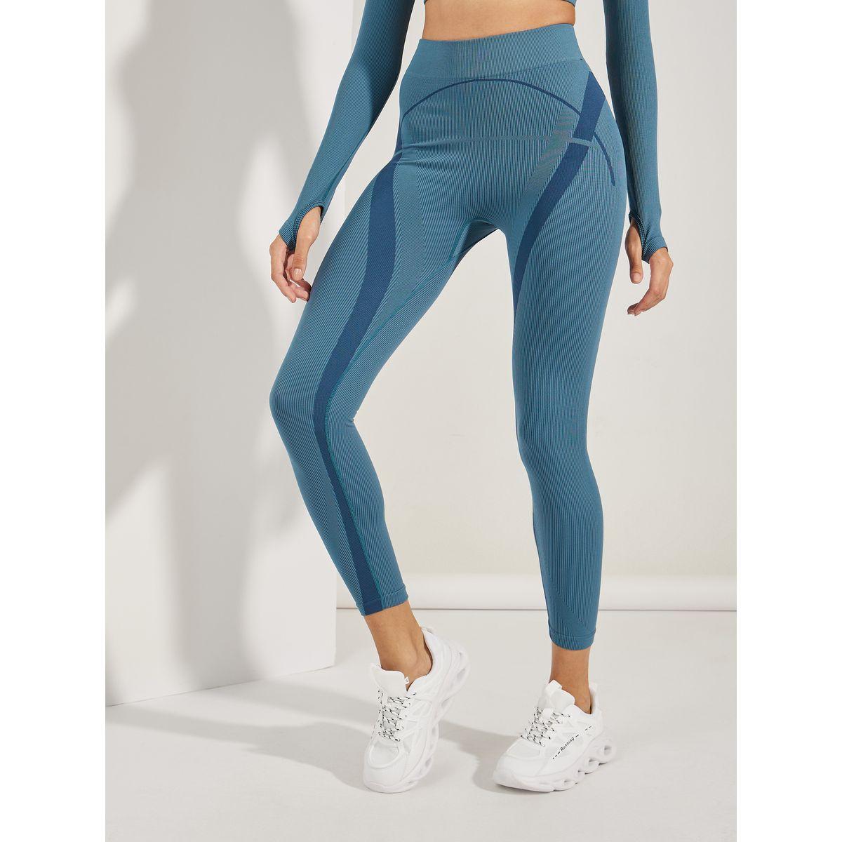 مجموعة من ليقنز وبلوزة قصيرة بنمط كتل الالوان-sports-women-clothing-trackpantsandtracksuits-image-6