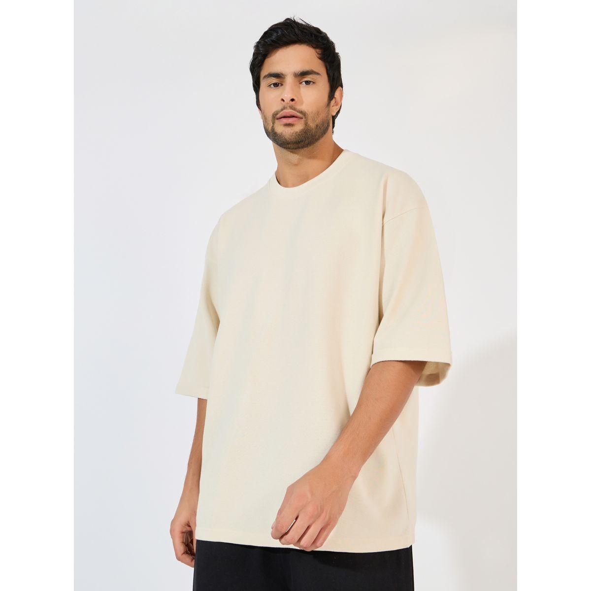 تيشيرت تيري بقصة بوكسي وأكمام ملفوفة-men-clothing-tshirtsandpolos-tshirts-image-1