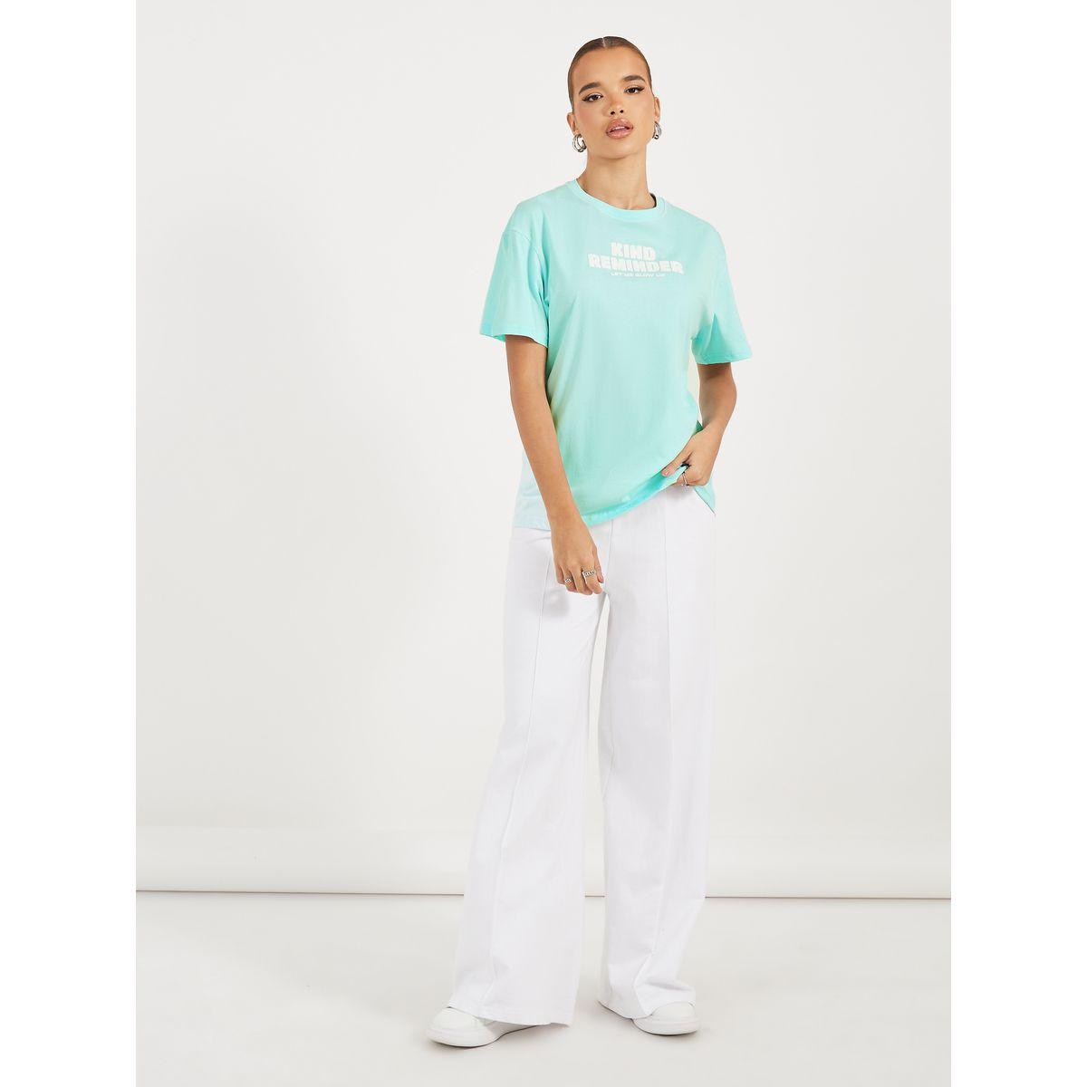 تيشيرت فضفاض بطبعة كتابة وياقة دائرية-women-clothing-tshirts-image-2