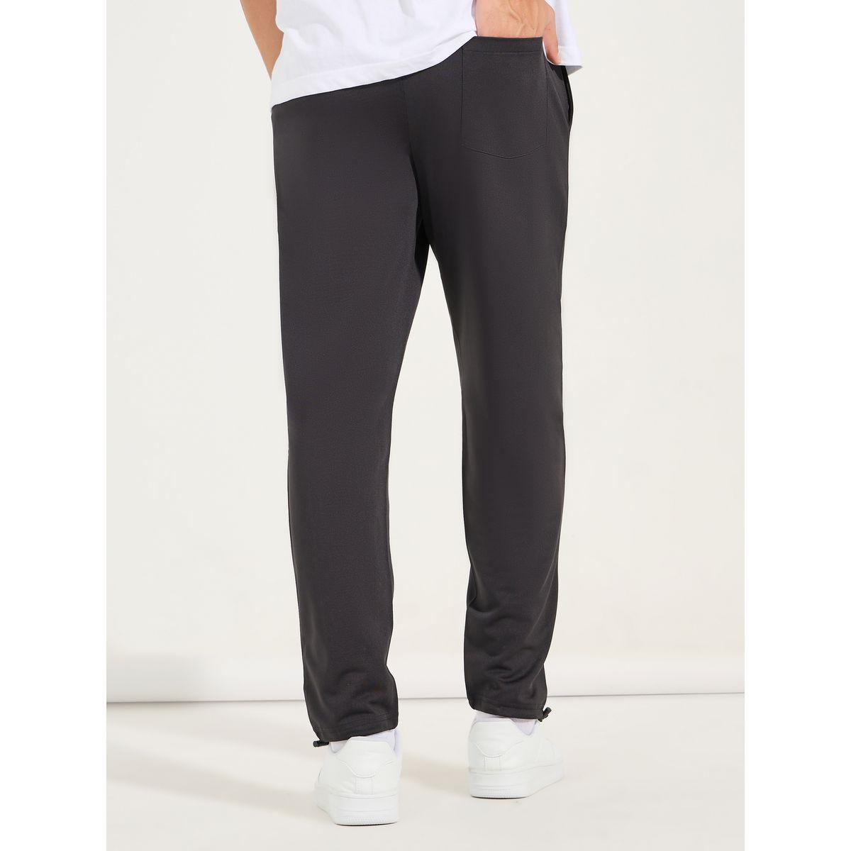 جوغر بتفاصيل محزوزة مع شارة-men-clothing-sportswearandactivewear-bottoms-joggers-image-5