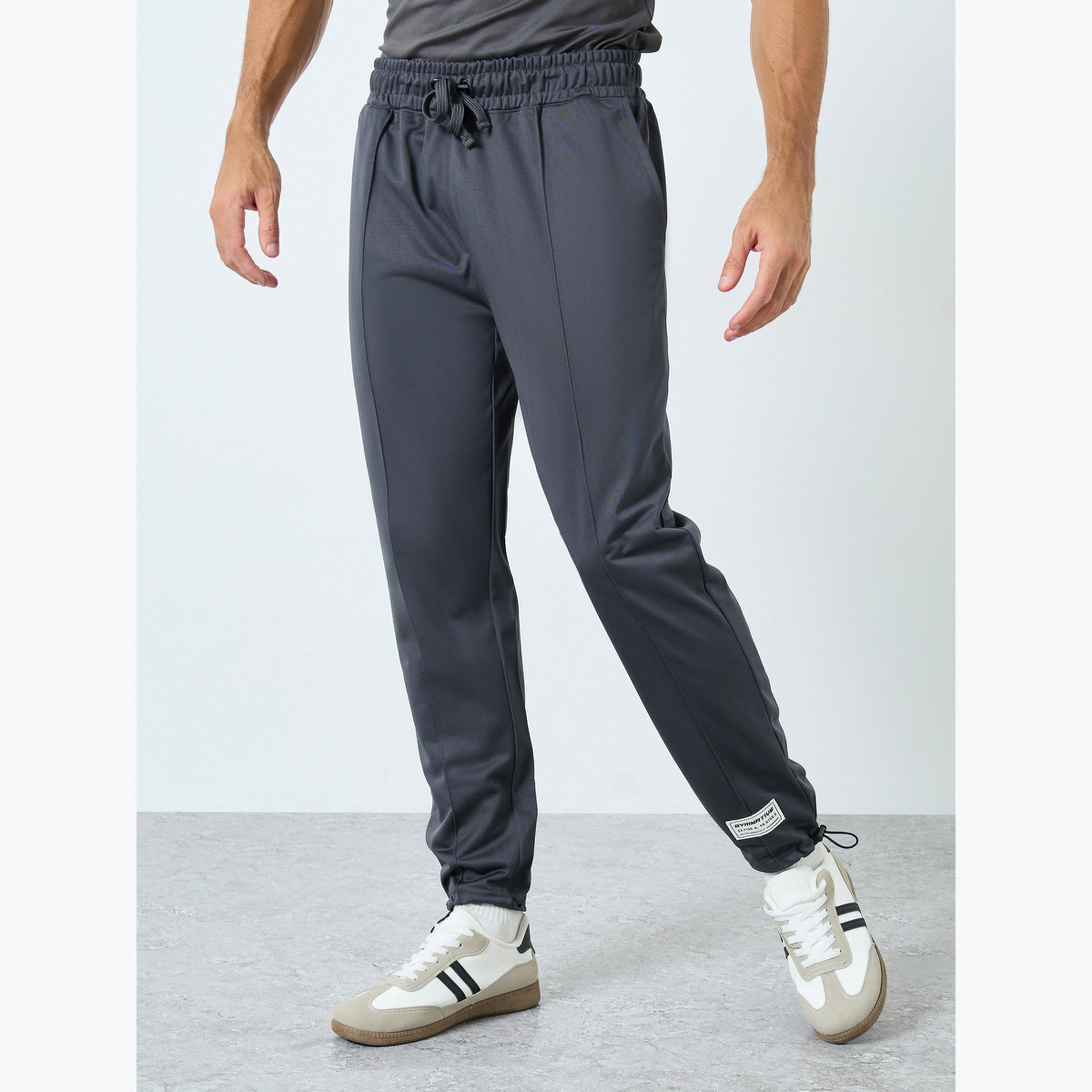 جوغر رياضي ناعم بقصة ضيقة للرجال-men-clothing-sportswearandactivewear-bottoms-joggers-image-1