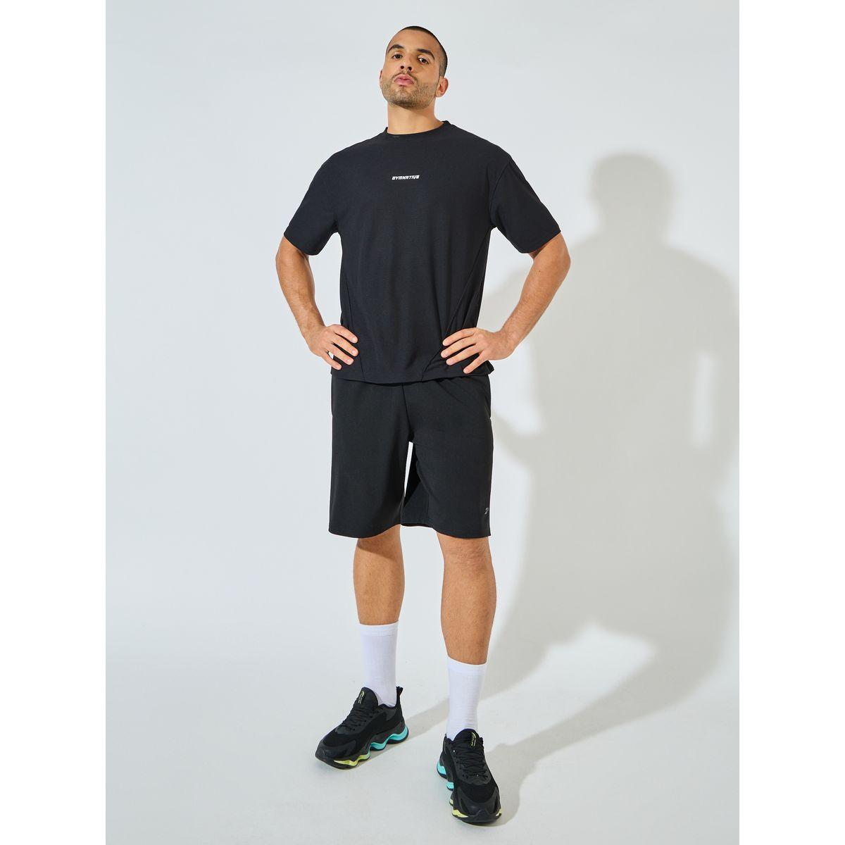 تيشيرت فضفاض مطبع بكتابة مع تفاصيل محزوزة-men-clothing-sportswearandactivewear-tshirtsandpolos-image-2