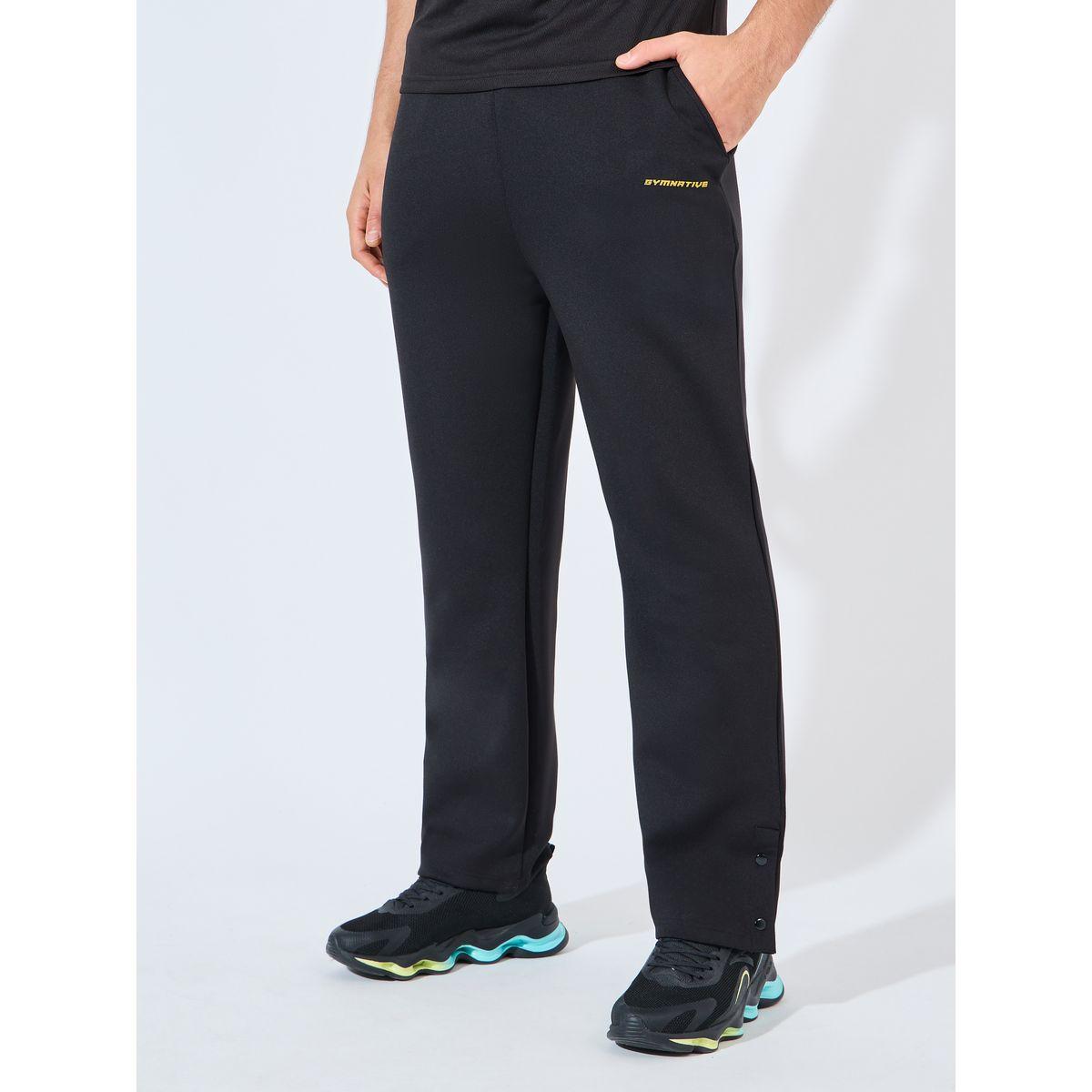 بنطال سكوبا بقصة مريحة وأزرار كبس-men-clothing-sportswearandactivewear-bottoms-joggers-image-1