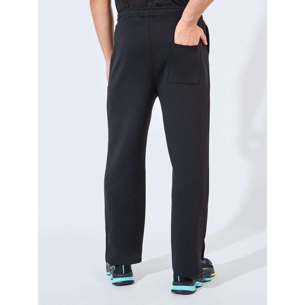 بنطال سكوبا بقصة مريحة وأزرار كبس-men-clothing-sportswearandactivewear-bottoms-joggers-image-6