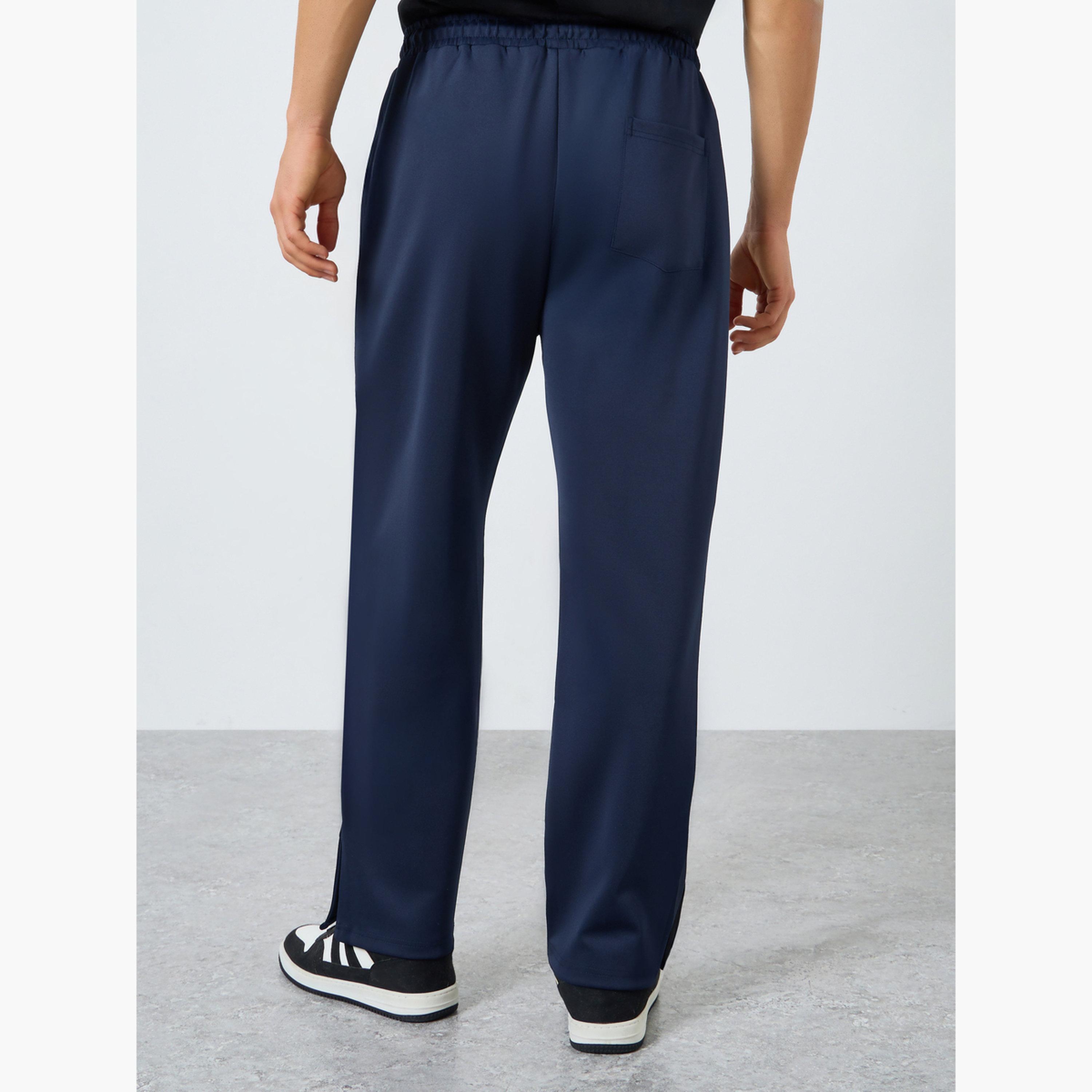 بنطال سكوبا بحواف مفتوحة وقصة مريحة للرجال-men-clothing-sportswearandactivewear-bottoms-joggers-image-5
